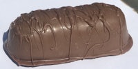 a chocolate bar with chocolate dripping on it